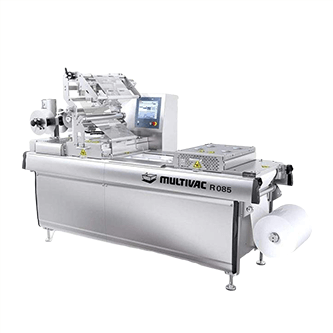 Food processing and filling machine
